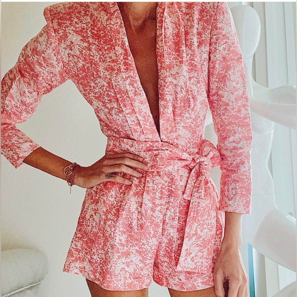 Pink and White print  shorts romper.